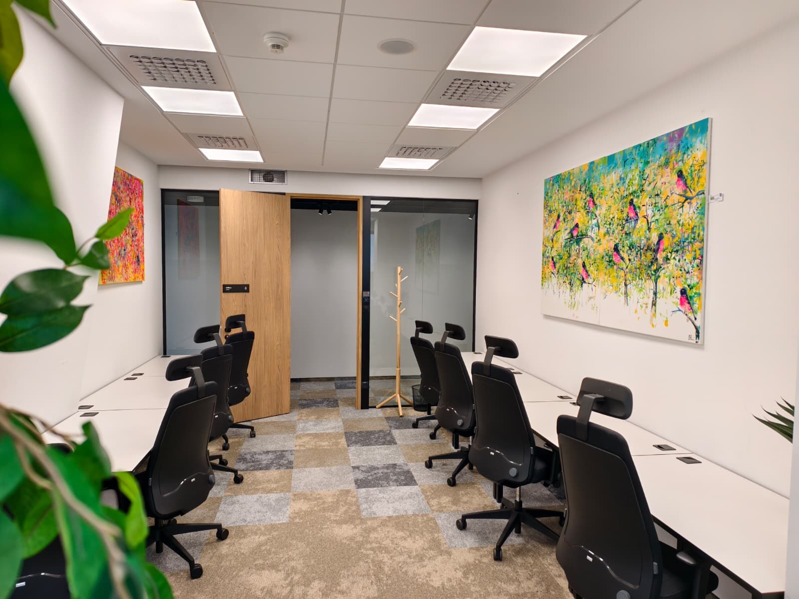Shared Lab28 office with eight workstations